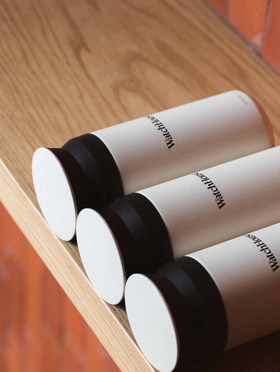 Three Kinto Tumblers laying on a bench 